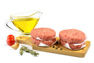 Raw beef patties for making a burger.Isolated on a white background.Selective Focus.