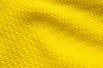 Yellow sports clothing fabric football shirt jersey texture close up