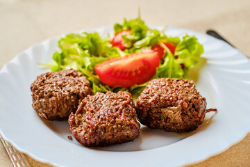 Mini naked burgers on plate