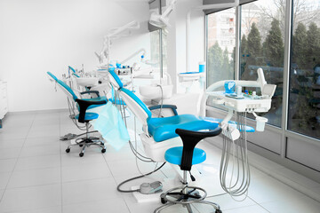 Interior of a modern dentist office with brand new dentist chairs