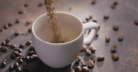 Instant coffee granules are poured into a white cup, then boiling water is poured, slow motion, macro top view. 300fps, Blackmagic Ursa Pro G2. - Powered by Adobe