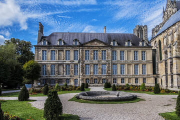 Fototapeta na wymiar Mediaeval Palace of Tau (Palais du Tau) and palace chapel (on right) in Reims. It was bishop palace and subsequently an archbishop palace. Reims, Champagne-ardenne, France.