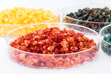 Molten chloride salts, crystals and crystallized rare earth sediments, chemicals used in industry for the production of various industrial items, in petri dishes