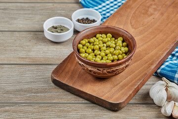 Marinated green pea beans in a wooden cup