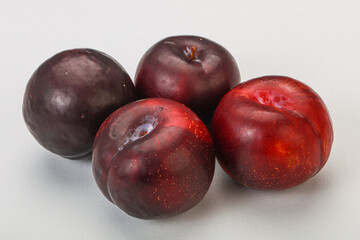Ripe sweet plum fruit heap