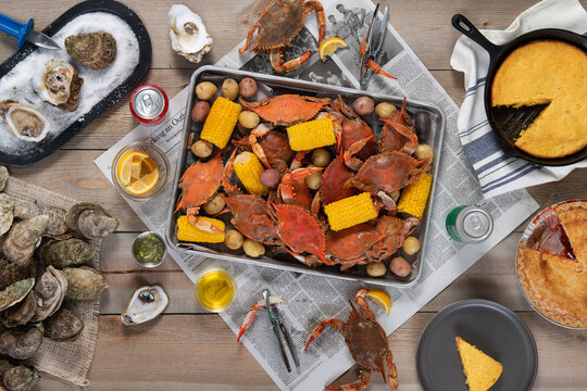 Seafood broil of oysters, crab, corn, potatoes