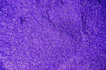 Close up of purple sand background