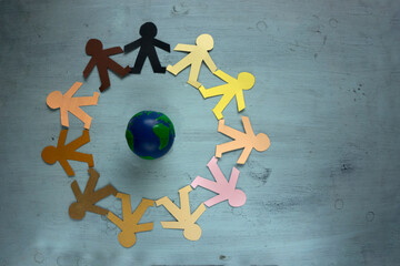 Humanity races protecting our planet Earth together as a society