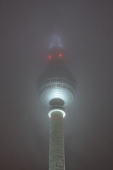 Berlin TV Tower at a foggy night