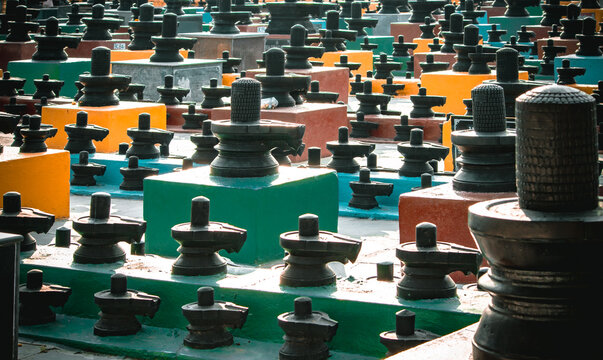 Group of idols(known as lingams) of god Shiva in a temple in Kolar, India