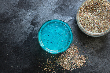 lemonade chia seed drink blue berry flavor in transparent glass blueberry on the table for healthy meal snack outdoor top view copy space for text food background image rustic