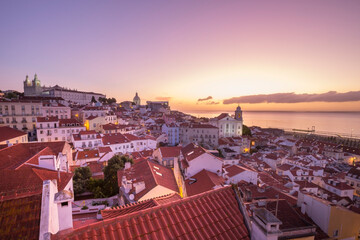 Big European city rooftop view just before sunrise. Lisbon, Portugal