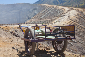 old cart on a mountain waiting for carrying sulfur down from a mountain. Ijen volcano on Java island.