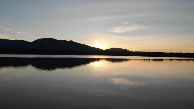 Staffelsee lake in Germany Bavaria recorded in the afternoon twilight flying over the lake with a DJI drone in 4k with ND filters