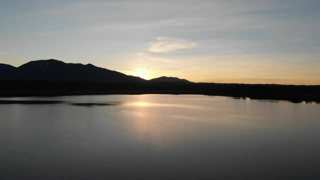 Staffelsee lake in Germany Bavaria recorded in the afternoon twilight flying over the lake with a DJI drone in 4k with ND filters
