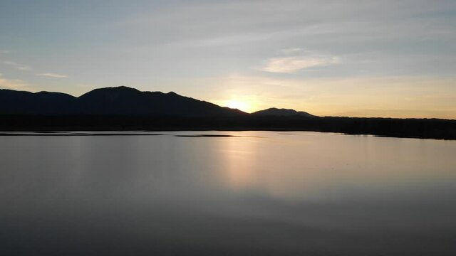 Staffelsee lake in Germany Bavaria recorded in the afternoon twilight flying over the lake with a DJI drone in 4k with ND filters