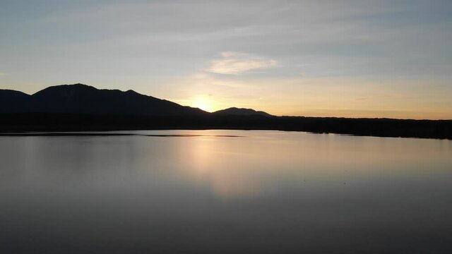 Staffelsee lake in Germany Bavaria recorded in the afternoon twilight flying over the lake with a DJI drone in 4k with ND filters