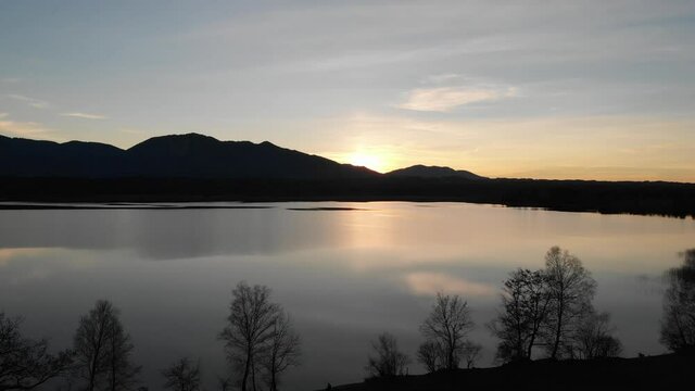 Staffelsee lake in Germany Bavaria recorded in the afternoon twilight flying over the lake with a DJI drone in 4k with ND filters