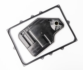 oil filter strainer in automatic transmission with rubber gasket on white background