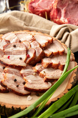 Roasted pork belly sliced on wooden plate