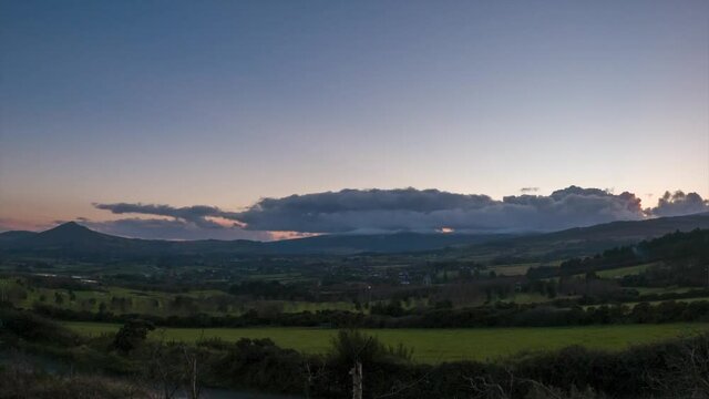 Time Lapse of Sunset Over Snow Capped Mountains, North East Wicklow