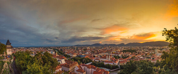 Cityscape of Graz and the clock tower (Grazer Uhrturm), famous tourist attraction on Shlossberg...