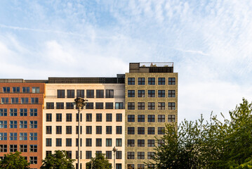 Berlin cityscape with apartment buildings against blue sky