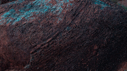 Ciemne fioletowo czerwone kamienne tło, tekstura pełna szczegółów.