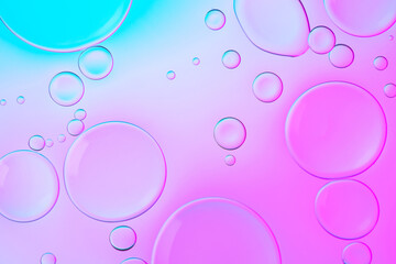 Vivid neon background with bubbles. Colorful abstract backdrop with bright gradients on blobs. Blue and pink overflowing colors.