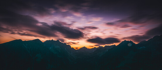 Fototapeta na wymiar Sunset panorama in High Tatras mountains national park. Mountain popradske lake in Slovakia.