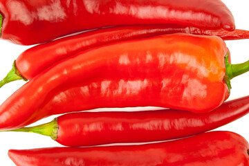 Long sweet peppers and hot cayenne peppers mix isolated on a white background. Close up