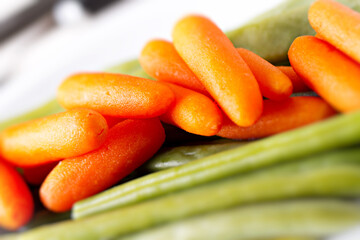 Carrots and green beans. Macro shoot. High quality photo.