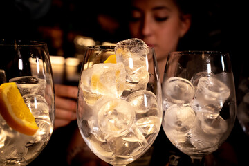 Detail of a few drinks in a bar with a young atmosphere.