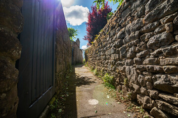 Fototapeta na wymiar old village france alley stone walls 