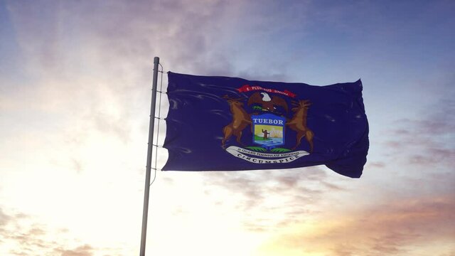 State flag of Michigan waving in the wind. Dramatic sky background. 4K
