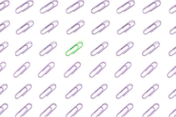 Business minimal concept as a group of paperclip on canvas with one individual in the opposite direction.