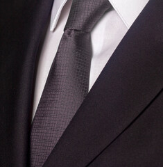 Close up of business suit and tie
