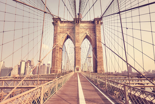 Retro color toned picture of Brooklyn Bridge, New York City, USA.