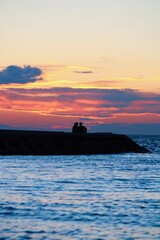 Naklejka na ściany i meble silhouette of a couple at sunset