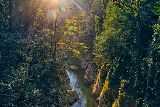 Khosta River flowing through Devils Gate canyon at dusk