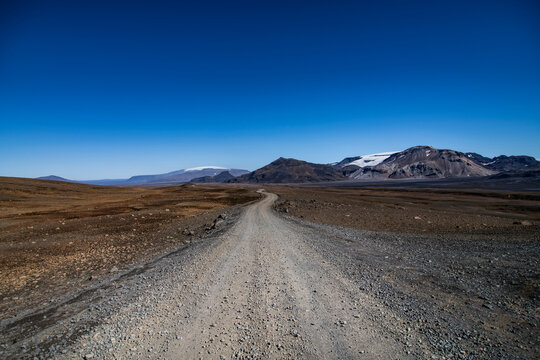 Kaldidalur dirt road 550 against mountain and clear sky