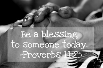 Inspirational quote - Be a blessing to someone today. Proverbs 11.25. On background of women holding hands on lap, kindness and giving support concept.