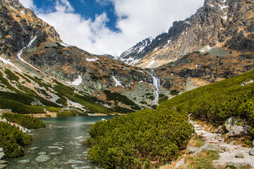 Velicke pleso lake with waterfall in Tatra mountains Slovakia