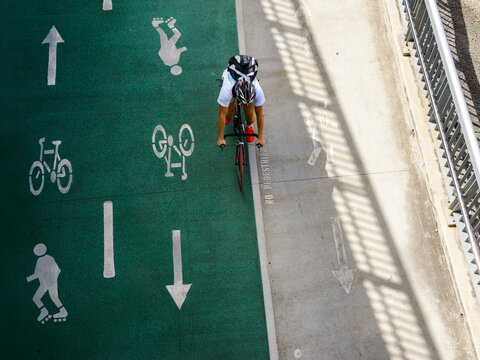 Looking down on cyclist on bikeway