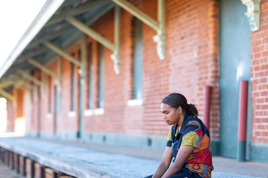 Disused Train Platform With Solitary Figure