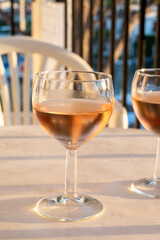 Drinking of local rose wine in summer Provence, France