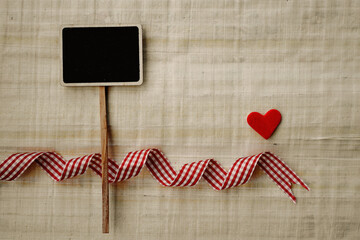 Valentines day background eith hearts and blackboard