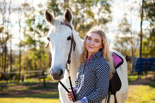 Portrait of horse and smiling happy person