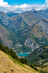 Fototapeta premium Hiking near ski station Les deux Alpes and view on Alpine mountains peaks in summer, Isere, France