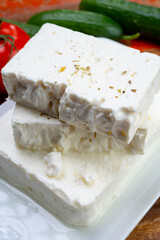 Cheese collection, white Greek salty feta cheese ready to eat